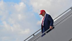 US President Donald Trump steps off Air Force One after landing at the Palm Beach International Airport in West Palm Beach, Florida on February 16, 2025, after attending the Daytona 500 car race earlier in the day.