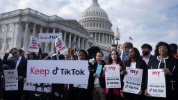 People gather for a press conference about their opposition to a TikTok ban on Capitol Hill in Washington, DC on March 22, 2023. - The White House was reported on March 15, 2023, to have told the app TikTok that it will be banned in the US if it continues to be owned by the Beijing-based tech firm Bytedance.