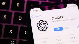 A laptop keyboard and ChatGPT on AppStore displayed on a phone screen are seen in this illustration photo taken in Krakow, Poland on June 8, 2023. (Photo by Jakub Porzycki/NurPhoto)NO USE FRANCE