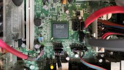 Intel silicon CPU Taiwanese microprocessor chip at the center of a motherboard circuitboard in Munich, Germany on April 16 2023.